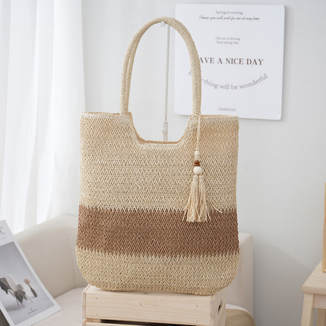 Nuevo bolso tote tejido de estilo chino para mujer: diseño con borlas, ligero y transpirable.