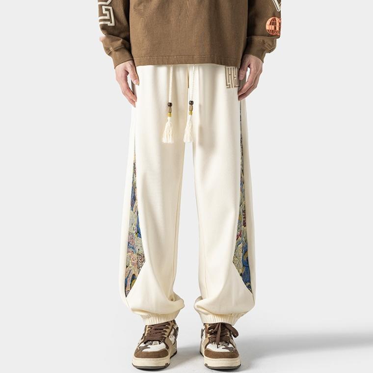 Pantalones casuales de tendencia nacional para hombre, primavera 2024: estilo urbano americano, pantalones deportivos holgados.