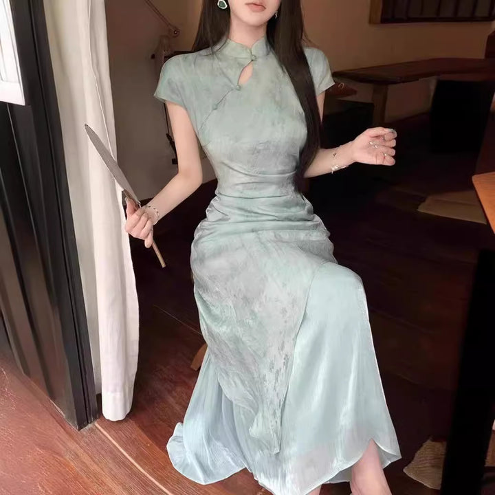 Nuevo vestido cheongsam de manga corta abotonado mejorado de estilo chino para mujer en verano con temperamento de estilo nacional, costura en la cintura, falda larga tipo A
