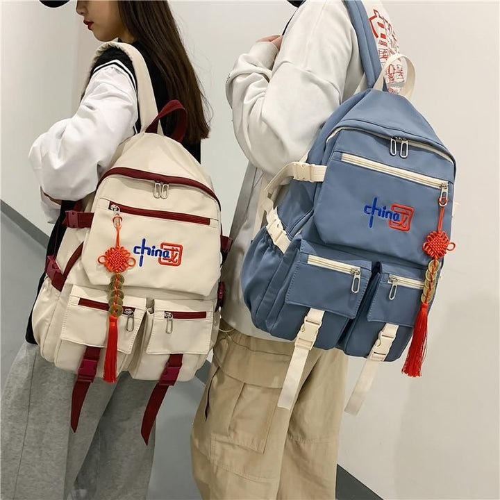 Mochila de estilo chino HD para niñas y niños, moderna y de gran capacidad para portátiles de estudiantes de secundaria y universitarios.