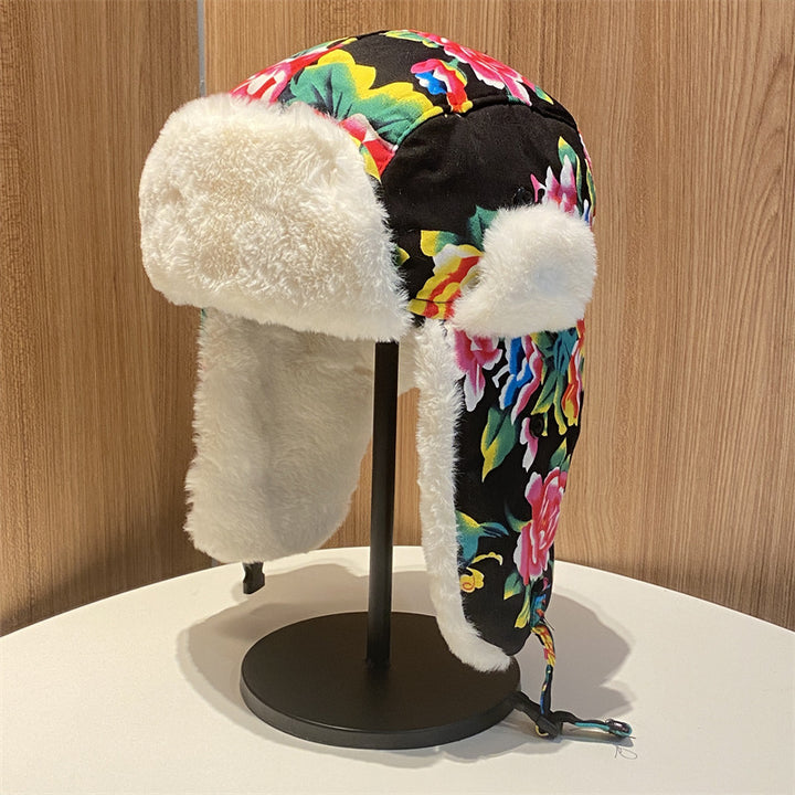 Gorro Lei Feng de invierno para mujer: cálido y protector auditivo, gorro de algodón con estampado floral del noreste para hombre, gorro de cola de estilo étnico retro.