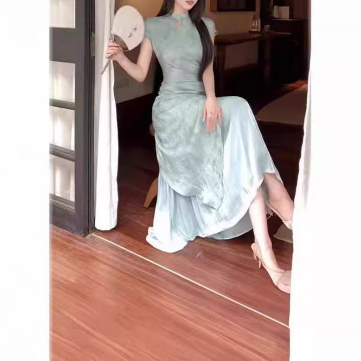 Nuevo vestido cheongsam de manga corta abotonado mejorado de estilo chino para mujer en verano con temperamento de estilo nacional, costura en la cintura, falda larga tipo A