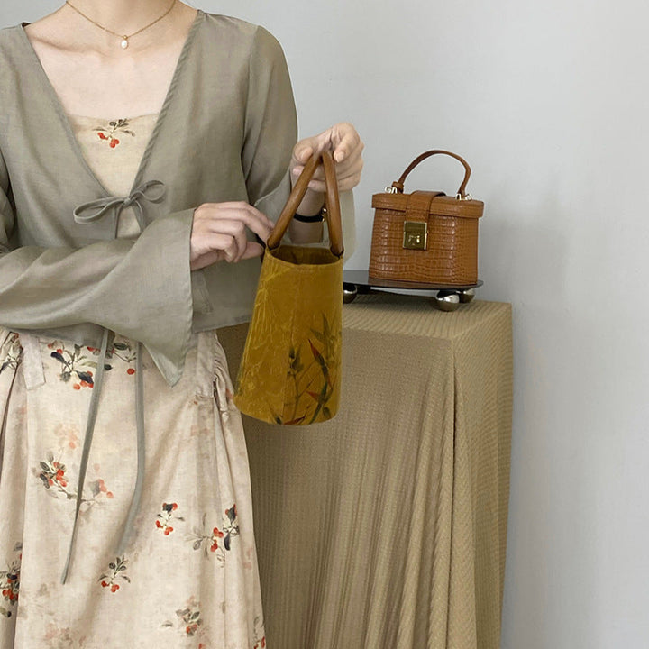 Conjunto de vestido con tirantes estilo cheongsam mejorado de primavera y verano de Jiangzuo Xinghua Yanyu, nuevo estilo nacional retro chino