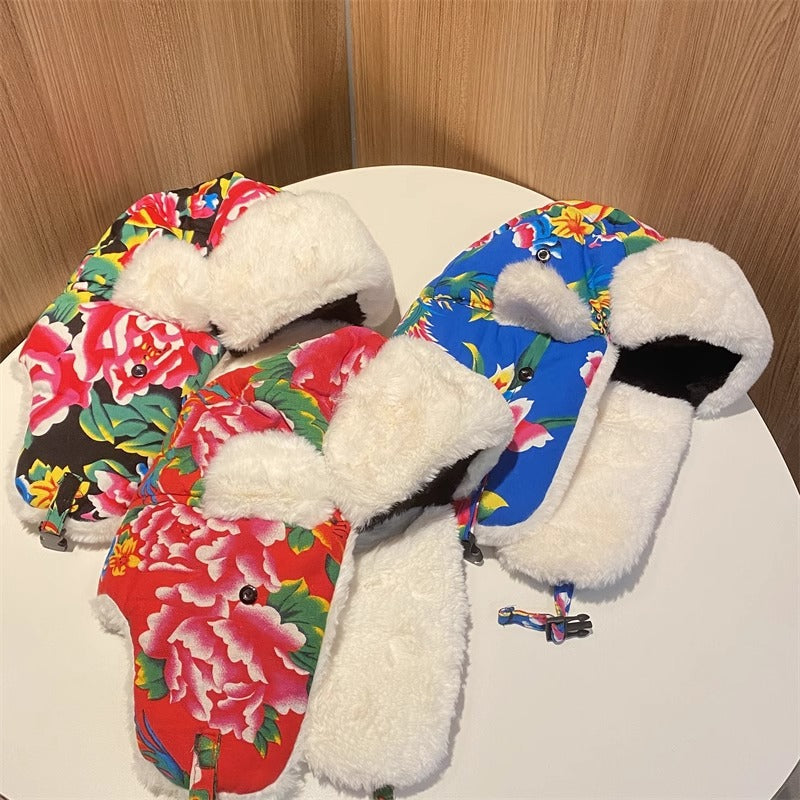 Gorro Lei Feng de invierno para mujer: cálido y protector auditivo, gorro de algodón con estampado floral del noreste para hombre, gorro de cola de estilo étnico retro.