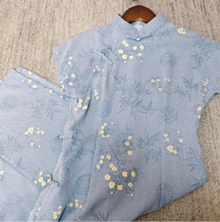 Tang Yilian 2025 verano nuevo cheongsam verde mejorado estilo joven cielo estrellado en relieve pequeño vestido de algodón y lino