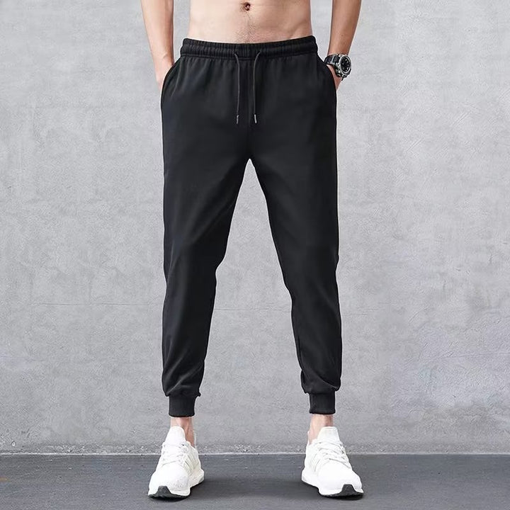 Pantalones casuales bordados de tendencia china para hombre | Edición primavera/otoño | Pantalones deportivos holgados con dobladillo | Pantalones deportivos modernos y versátiles