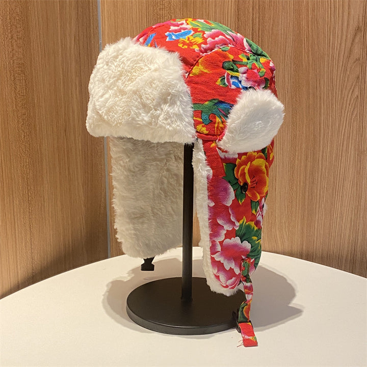 Gorro Lei Feng de invierno para mujer: cálido y protector auditivo, gorro de algodón con estampado floral del noreste para hombre, gorro de cola de estilo étnico retro.