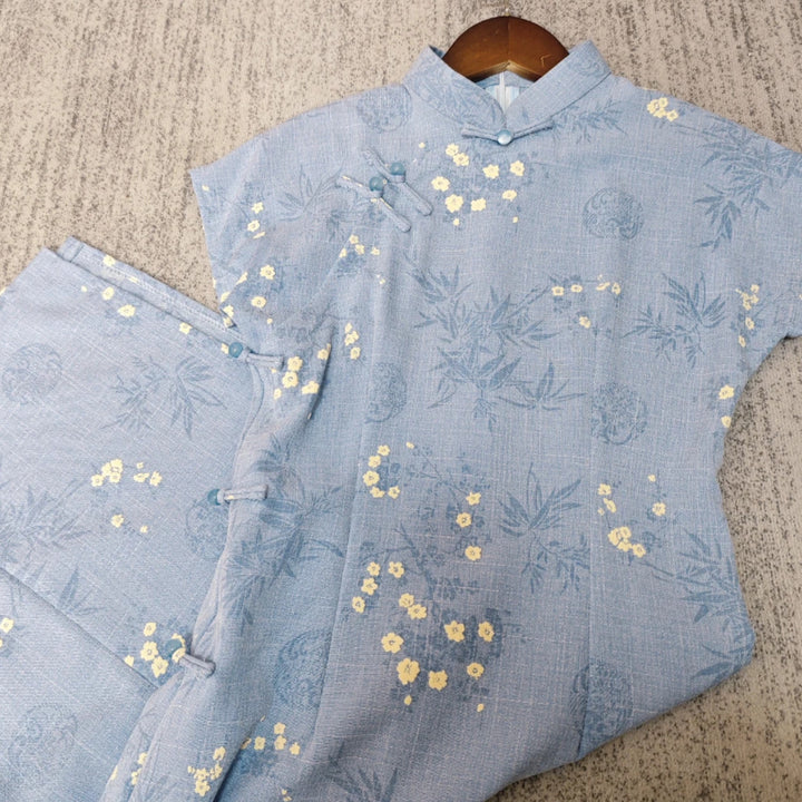 Tang Yilian 2025 verano nuevo cheongsam verde mejorado estilo joven cielo estrellado en relieve pequeño vestido de algodón y lino