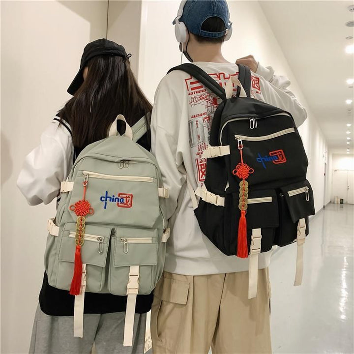 Mochila de estilo chino HD para niñas y niños, moderna y de gran capacidad para portátiles de estudiantes de secundaria y universitarios.