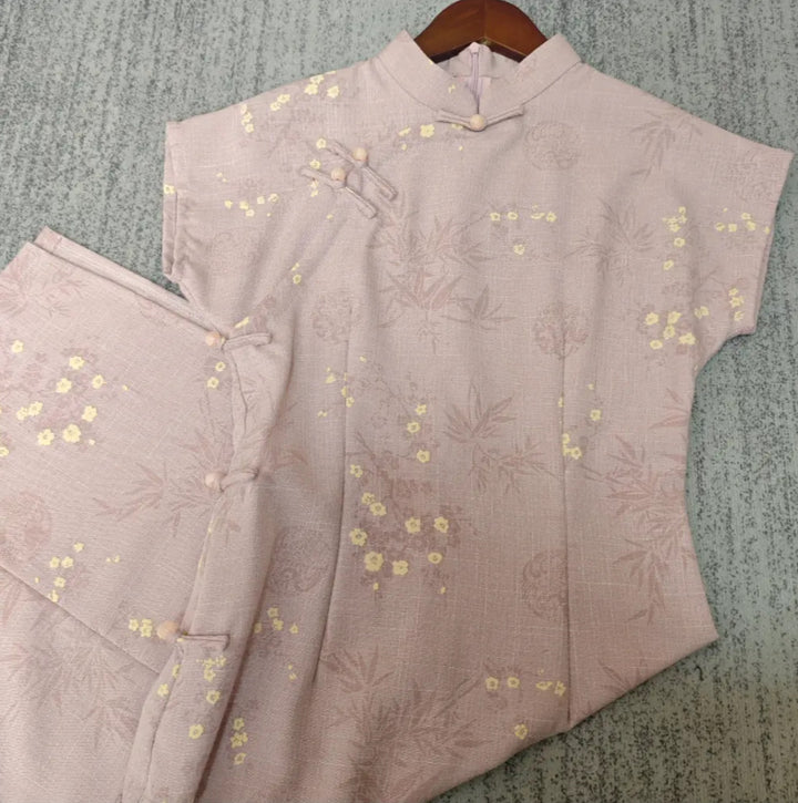 Tang Yilian 2025 verano nuevo cheongsam verde mejorado estilo joven cielo estrellado en relieve pequeño vestido de algodón y lino
