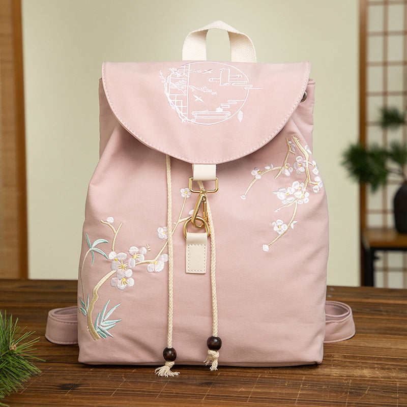 china embroidered leather backpack Mirbet Black snacks or notes from admirers Two side pockets for water bottles or gear Interior padded sleeve that fits a 13 laptop or iPad Cushioned exterior zip pocket that fits a 16 laptop for easy access and security Adjustable straps to customize the fit Top grab handle for hanging and carrying ease Luggage sleeve to make this the perfect travel companion And so many other extras Traditional Chinese Embroidered Backpack