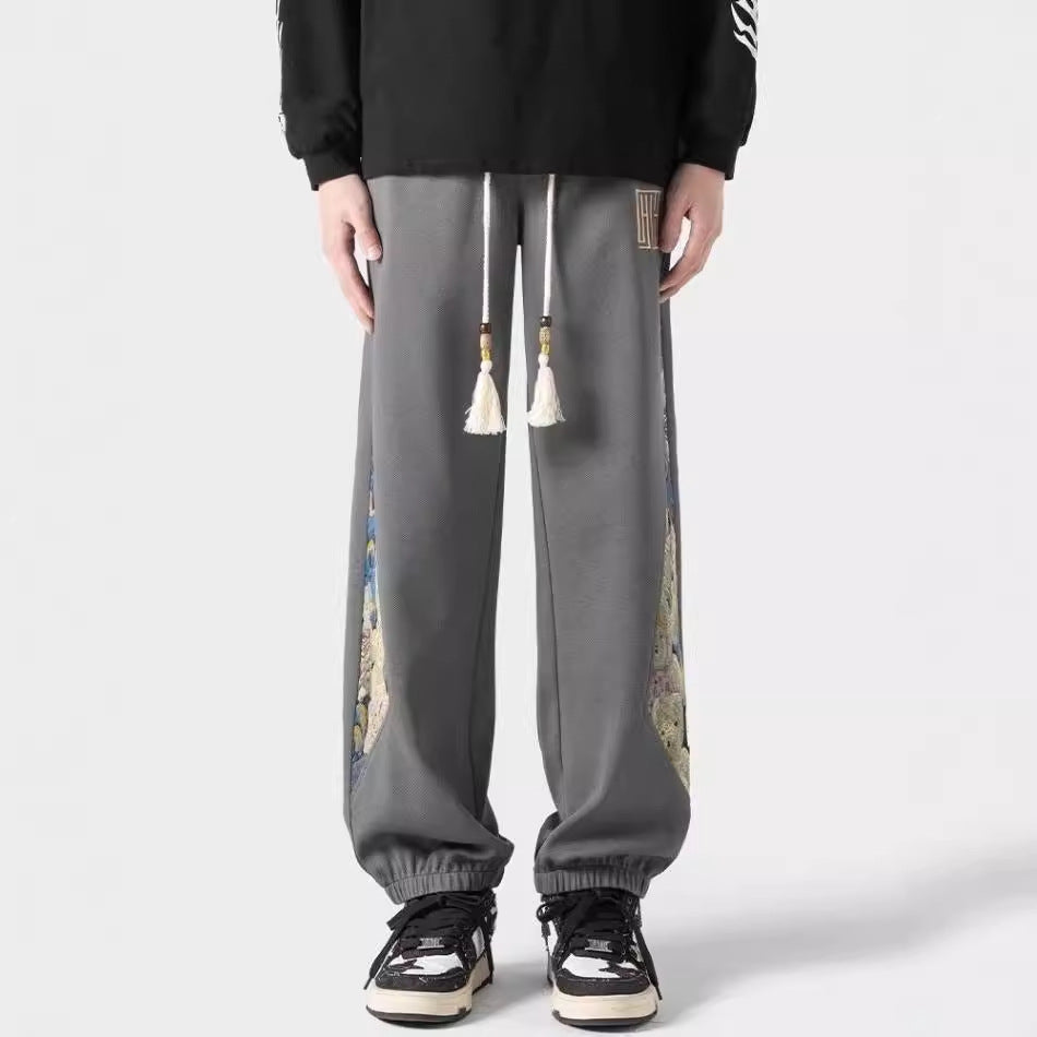 Pantalones casuales de tendencia nacional para hombre, primavera 2024: estilo urbano americano, pantalones deportivos holgados.