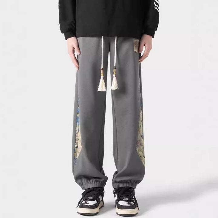 Pantalones casuales de tendencia nacional para hombre, primavera 2024: estilo urbano americano, pantalones deportivos holgados.