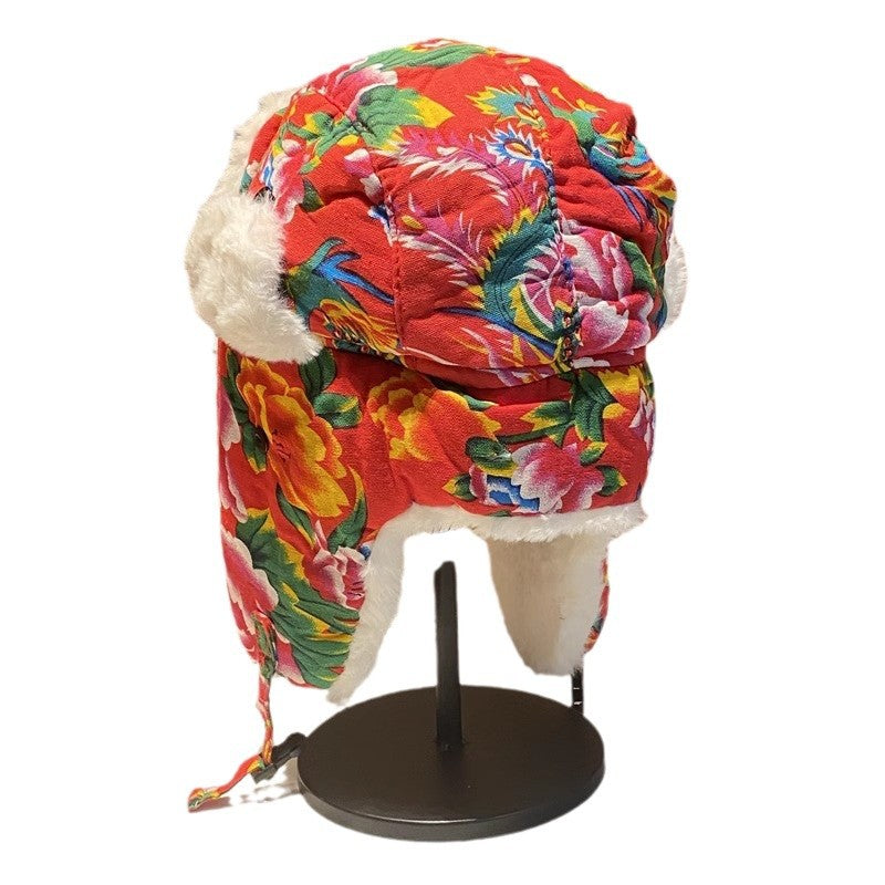 Gorro Lei Feng de invierno para mujer: cálido y protector auditivo, gorro de algodón con estampado floral del noreste para hombre, gorro de cola de estilo étnico retro.