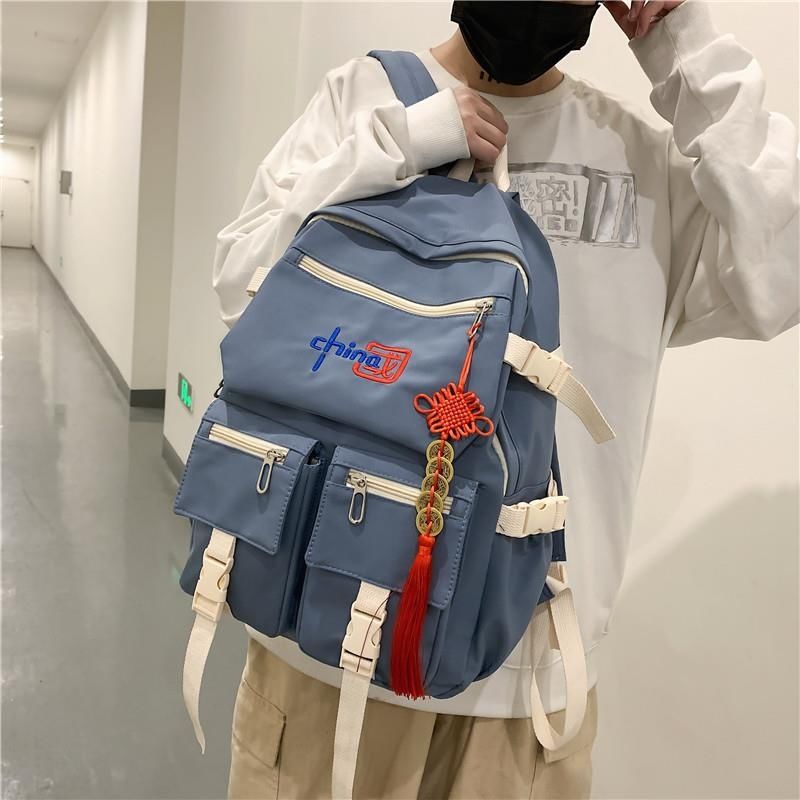 Mochila de estilo chino HD para niñas y niños, moderna y de gran capacidad para portátiles de estudiantes de secundaria y universitarios.