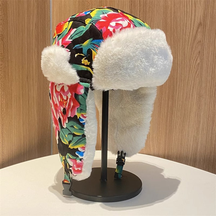 Gorro Lei Feng de invierno para mujer: cálido y protector auditivo, gorro de algodón con estampado floral del noreste para hombre, gorro de cola de estilo étnico retro.