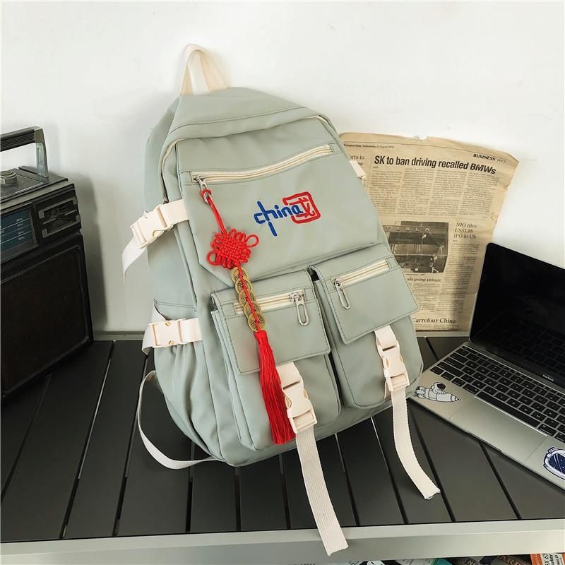 Mochila de estilo chino HD para niñas y niños, moderna y de gran capacidad para portátiles de estudiantes de secundaria y universitarios.