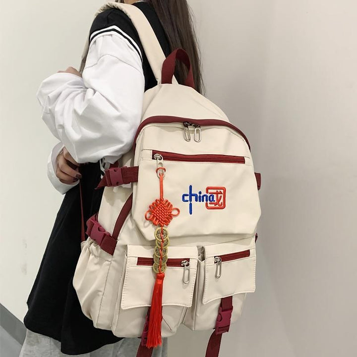 Mochila de estilo chino HD para niñas y niños, moderna y de gran capacidad para portátiles de estudiantes de secundaria y universitarios.